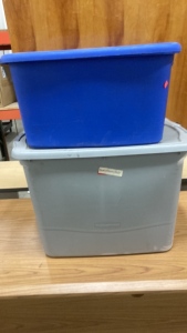 Two plastic storage totes with lids