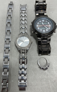 (1) Silver And Amethyst Ladies Ring (1) Men&rsquo;s Watch, (1) Ladies Watch W/ Clear Gemstones, (1) Men&rsquo;s Silver Toned Bracelet