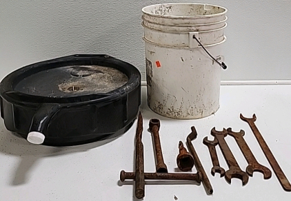 Oil Pan, Bucket of Wrenches and Other Tools