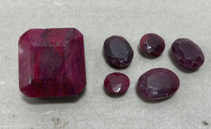 (1) 122.05ct Pendant Size Madagascar Ruby, (3) Oval Cut And (2) Round Cut Madagascar Rubies