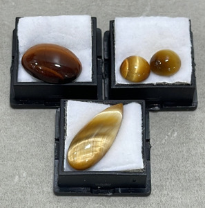 (4) Tigers Eye Oval, Teardrop, And Round Cut And Polished
