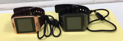 (2) Smart Watch Phones, (2) USB Cords That go with It