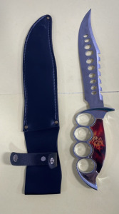 Large Dagger With Flaming Skull Handle Wuth Finger Holes And Black Sheath