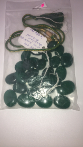 (1) Size 11 Dallas Cowboys ChampionshipRing ; (1) Size 11 Silver Band Silver Stone Ring; (1) Size 13 Silver Band Opal Shaped Mood Ring ; (1) Oval Single Set Green Brazilian Emerald Necklace w/ Green Tassel
