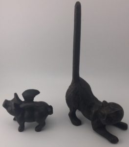 (1) Cast Iron Flying Pig (1) Cast Iron Cat Paper Towel Holder