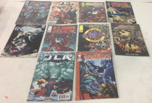 (10) Action Comics/Graphic Novels Including JLA, Justice Society Of America And More!!