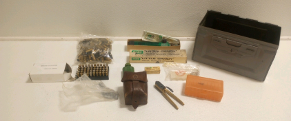 (1) RCBS Little Dandy Pistol Powder Measure (1) Vintage Metal Ammo Can (1( Leather Ammunition Pouch (1) Bag Of .44 REM Mag Brass Cases (50) used .38 Special Cases and More!