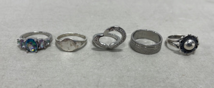 (1) Mystic Rainbow Silver Topaz Ring Size 7, (4) Silver Toned Rings
