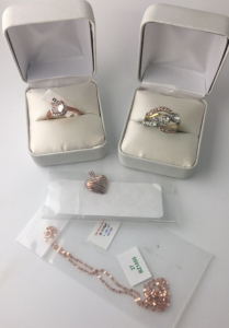 (1) Size 7 Rose Gold Square Cut Stone Ring ; (1) Size 7 Silver Band w/ 3 circular stone Costume Fashion Ring ; (1) 0.5&rdquo; Rose Gold Heart Shaped Pendant ; (1) 18K Rose Gold W: 0.78 gm L: app 16&rdquo; Ch 320