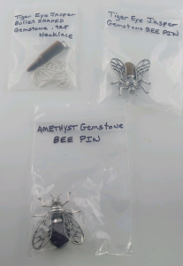 (1) Tiger Eye Jasper Bullet Shaped Gemstone With .925 Silver Necklace (1) Tiger Eye Jasper Gemstone Bee Pin (1) Amethyst Gemstone Bee Pin