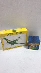 (1) John Deere JD95 DC-3 Company Airplane Bank (1) John Deere Singing Holiday Globe