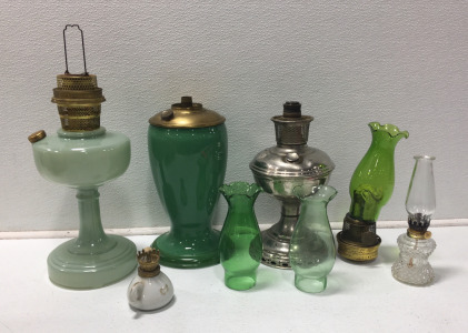 Various Assortments Of Vintage Oil Lamps And Accessories