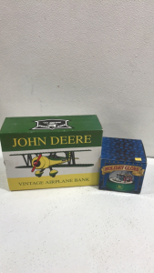 (1) John Deere Vintage Airplane Bank (1) John Deere Singing Holiday Globe