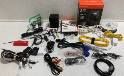 Assortment of Cables, Dual Hard Drive Docking Station, Blank CD-RWs, Mini Speaker