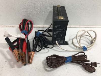 (1) Action Simply Smart 24 Volt Battery Charger (1) Jumper Cables (1) Extension Cord