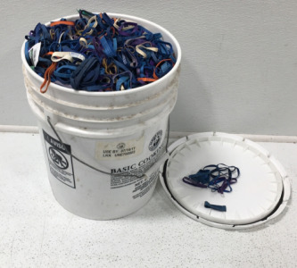 (1) Bucket Filled With Various Rubber Bands