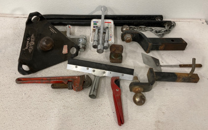 Various Hitches And Tools, First Aid Kit, Dolley For Removing Dents, Stabilize Bar For Camper And Other Tools