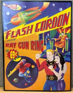 12”x 16” Metal Sign “Flash Gordon Official Ray Gun Ring”