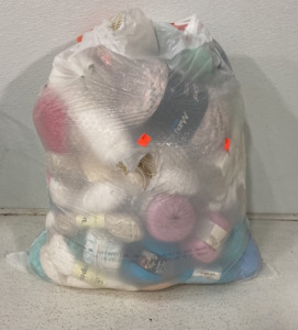 Large Bag Full Of Yarn And Other Fabrics