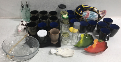 (7) Tan Coffee Mugs w/Flower (11) Black/Blue Coffee Mugs (2) Chile Platters (8) Assorted Glass Jars w/Lids (2) Oil & Vinegar Jars (1) Cow Decor (1) Goose Decor (1) Pillsbury Dough Boy Spoon Holder and more!