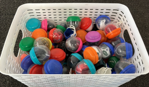 Basket of Plastic Football Helmets