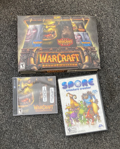 Warcraft Battle Chest PC Games and Books, and Spore PC Game