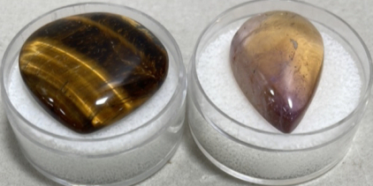 (1) 44.60ct Flashy AAA+ Tiger Eye Jasper Gemstone Cabochon, (1) 35.30ct Purple/Yellow Ametrine Teardrop Top Quality Gemstone Cabochon