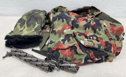 (1) Camouflage Rucksac Backpack, (1) Pair Insulated Camouflage Shoots Mittens, (1) WWII German M34/42 8mm Machine Gun Ammo Belt W/ Starter Tab