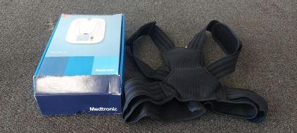 Medtronic Implantable Cardioverter Defibrillator and Mercase strap on back support