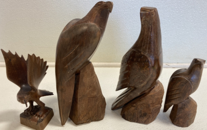 (4) Wood Hawk Sculptures