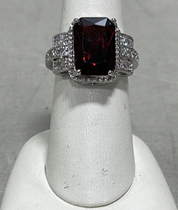 (1) Red Ruby Emerald Cut And Faceted .925 Ring, Size 7