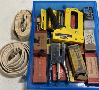 (1) Staple Gun, (1) Hand Stapler, Assorted Boxes of Staples, (2) Belt Straps