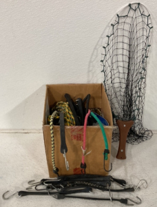 (1) Box Full Of Smart Straps And Bungee Straps For Securing Large Items, (1) Fish Catching Net