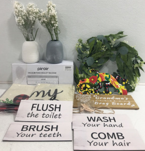 (1) Piroir Vacuum Food Sealer Machine (4) Wood Bathroom Signs (1) Grandma&rsquo;s Brag Board & Lots More!!