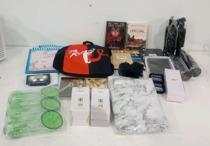 (1) Spiderman Laptop Backpack (4) Hit DVD Movies (5) Black universal Spray Bottles 72' Solar String Led Lights And Much More!!