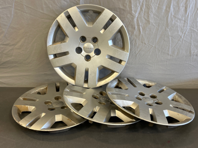 Set of 4 Dodge Hubcaps Please Inspect