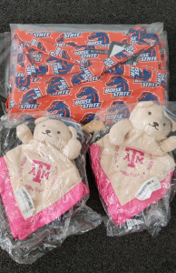 3 BSU Aprons and 2 Texas A&M baby security blankets.