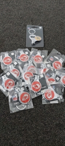 14 Kansas City 3 in 1 key chains and 1 Green Bay Packer 3 in 1 key chain.