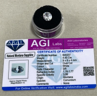 (1) 9.50ct Natural Rhodolite Garnet Round Cut And Faceted, (1) 4.45ct Natural Montana Sapphire Oval Cut And Faceted. Both W/ AGI Labs COA - 3