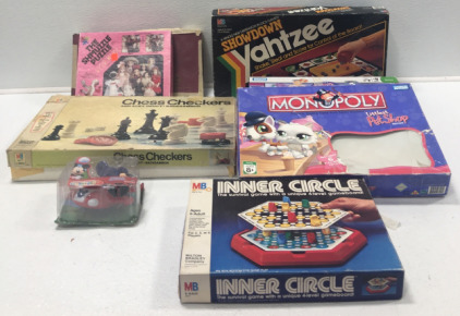 Chess/Checkers, Scrabble, (2) Monopoly Games, Inner Circle, Showdown Chance, Puzzle, Mickey Mouse Toy