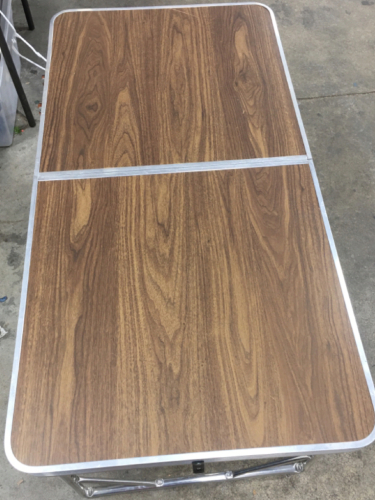 Adjustable Height Camp And Tailgate Table Open 24&rdquo; W X 48&rdquo; L. Folded 24&rdquo; W X 24&rdquo; L X 3&rdquo; H.