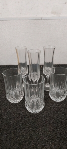 Crystal Glasses. Fire Fighter Knick Knack collection. 2 Small Picture Frames. Beveled Cut Glass 4"x6" Frame. Silverware Compartment. Bubba coffee thermace (no lid). One plate. Christmas garland & Tree star.