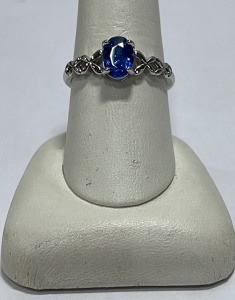 (1) Oval Cut And Faceted Blue Sapphire Silver .925 Ladies Ring Size 9