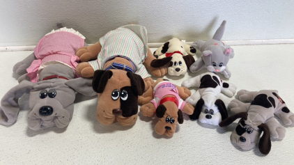 (7) Pound Puppies Stuffed Animals